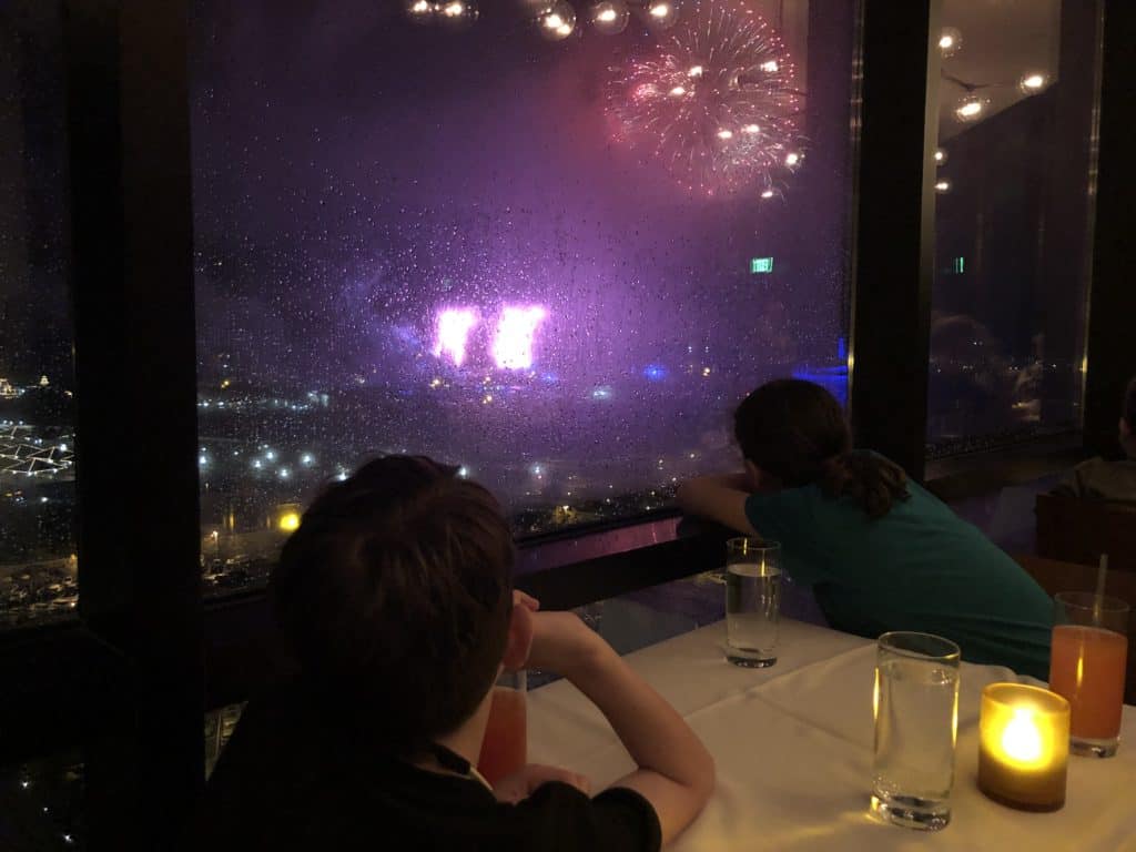 Magic Kingdom Fireworks view from a table in the California Grill at the Contemporary Resort in Walt Disney World.