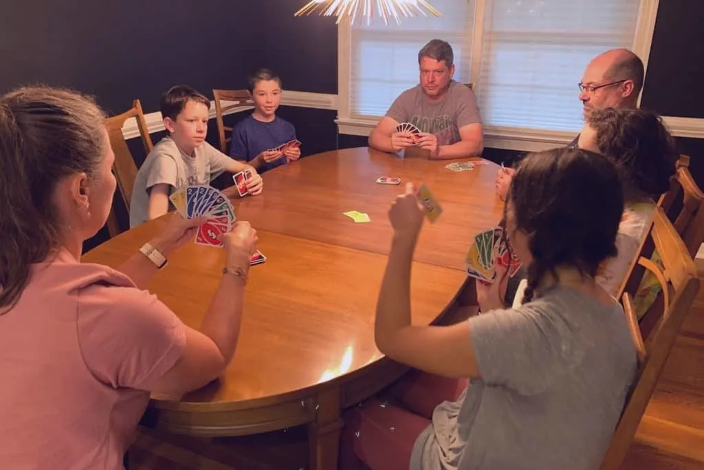 families playing Uno House Rules