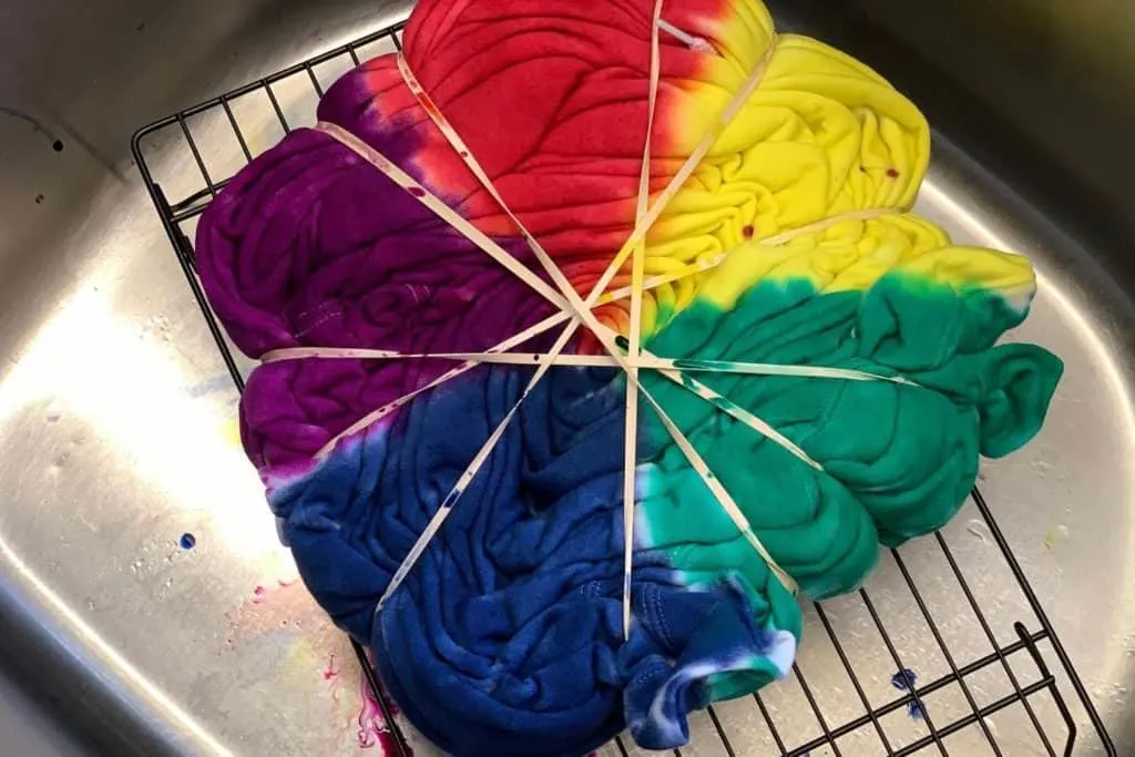 tie dye hoodie in the process of applying color