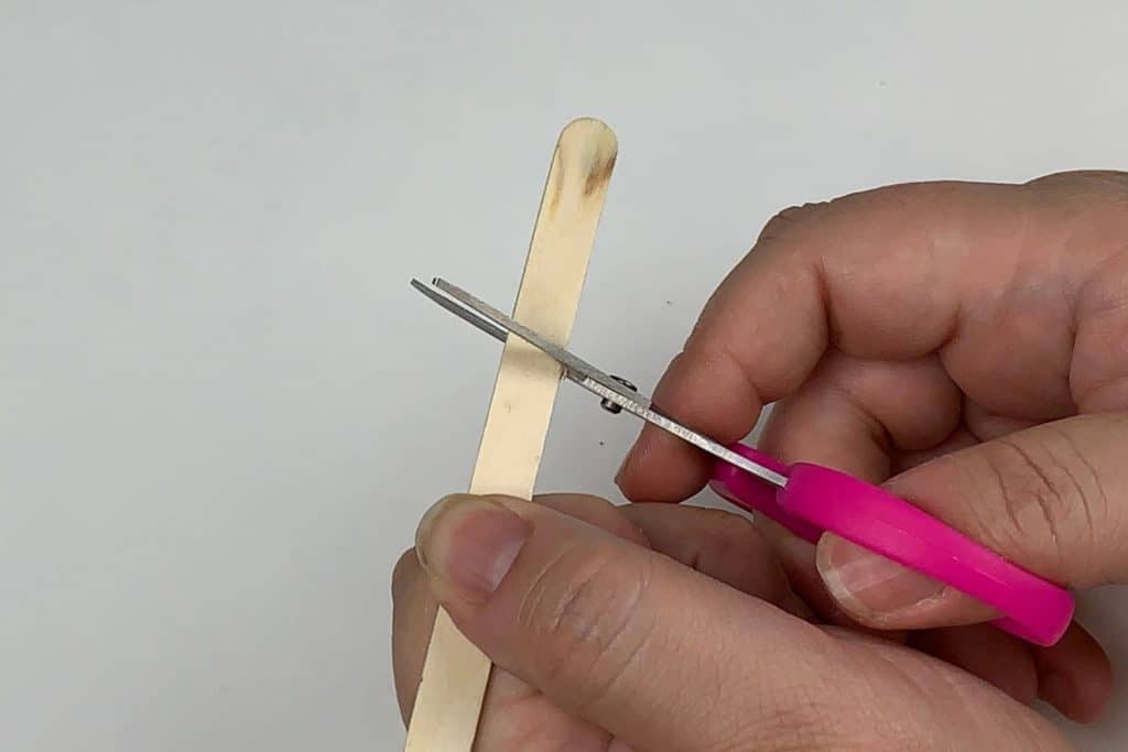 Trimming your popsicle sticks for your ornament