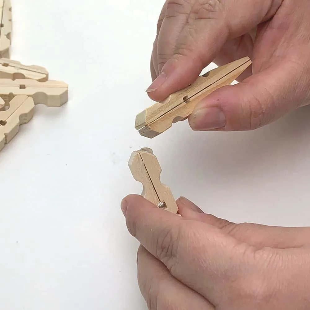 glue the clothespins at a right angle