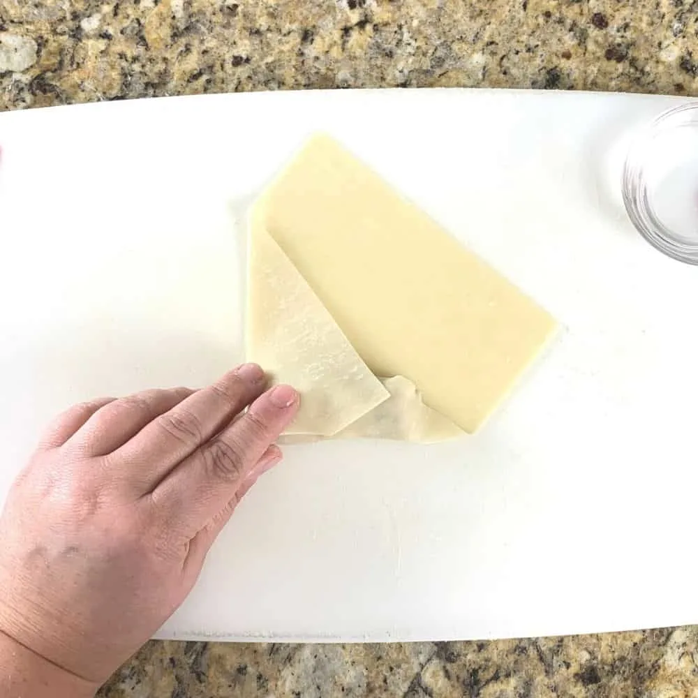 Folding the corners of the egg roll