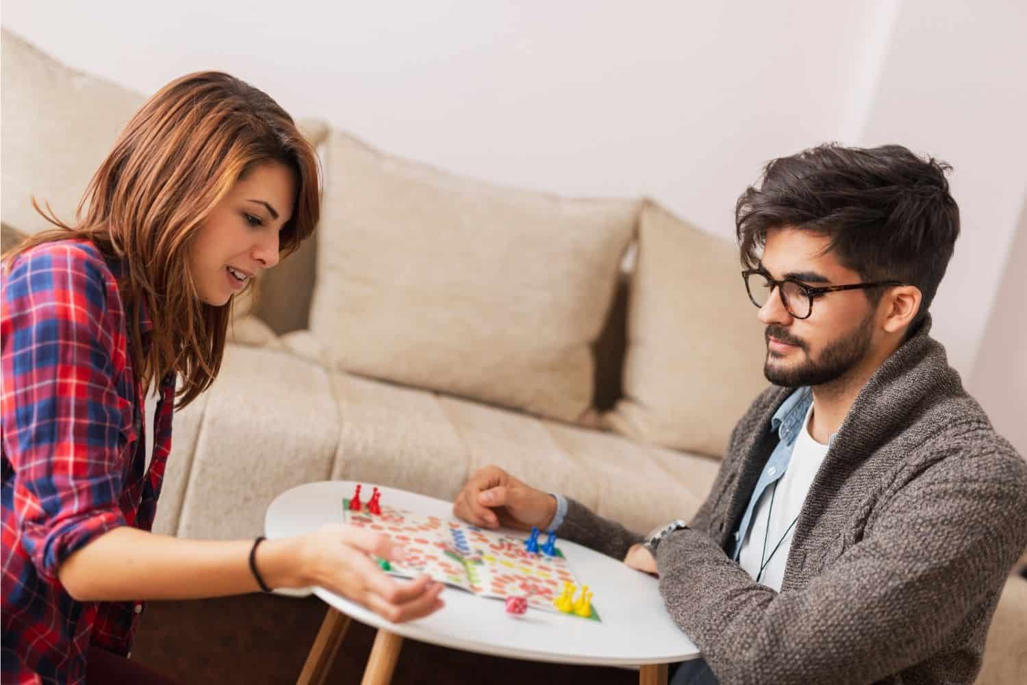 couple playing a board game