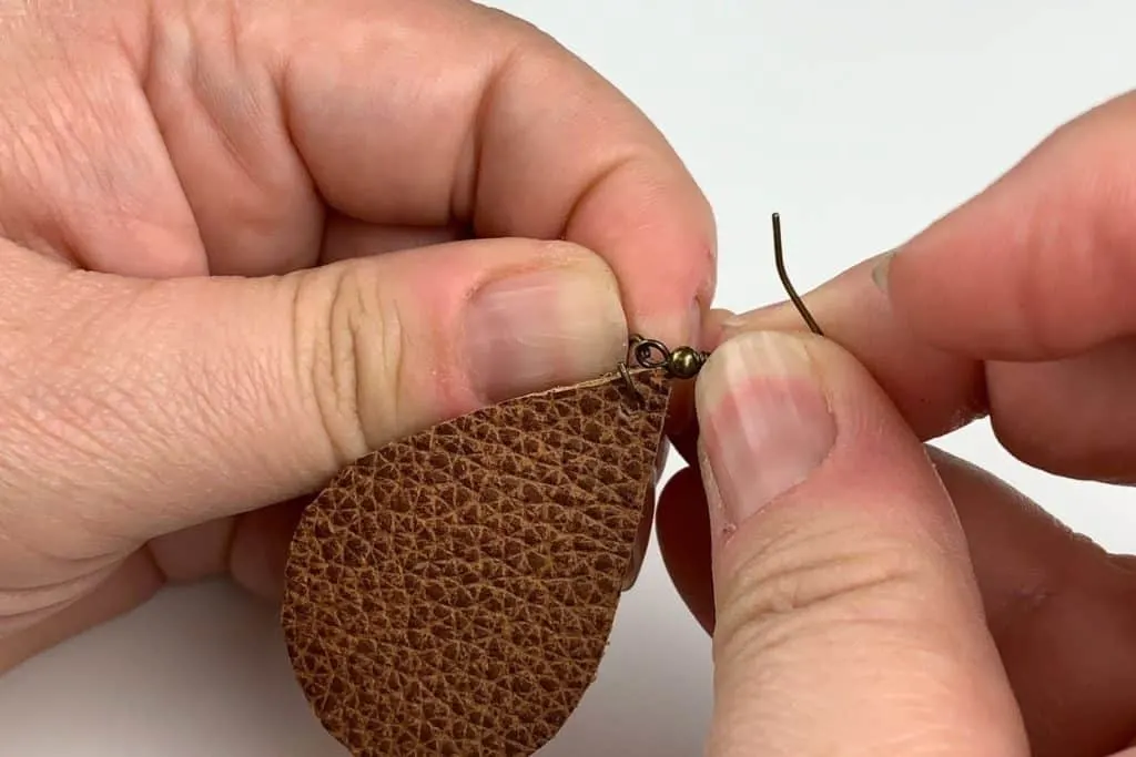 Attaching a jump ring to the earrings