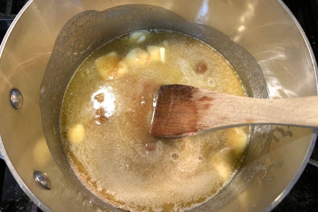 butter and brown sugar being cooked together