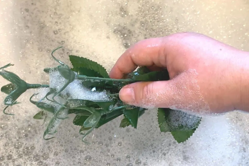 washing fake flowers