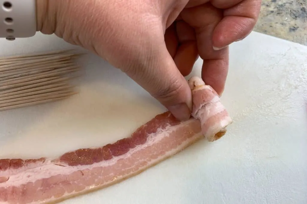 rolling a bacon rose