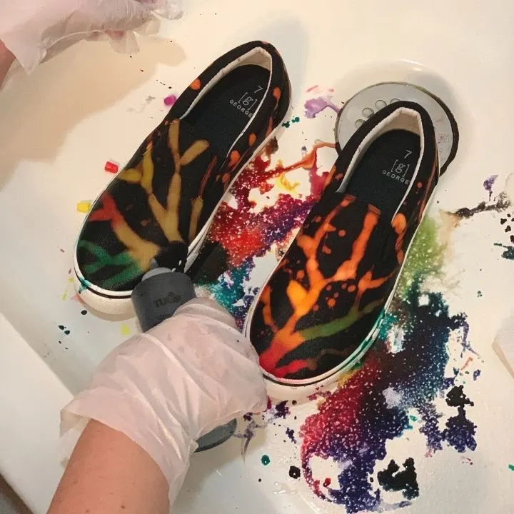 Applying dye to the shoes