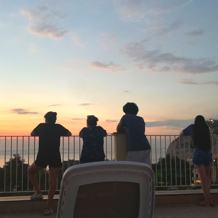 Viewing the sunset from the rooftop terrace at Sisters Hostel in Sorrento, Italy