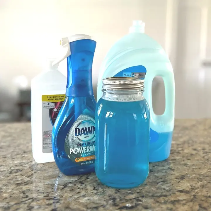 DIY Dawn Powerwash solution surrounded by the ingredients needed to make it