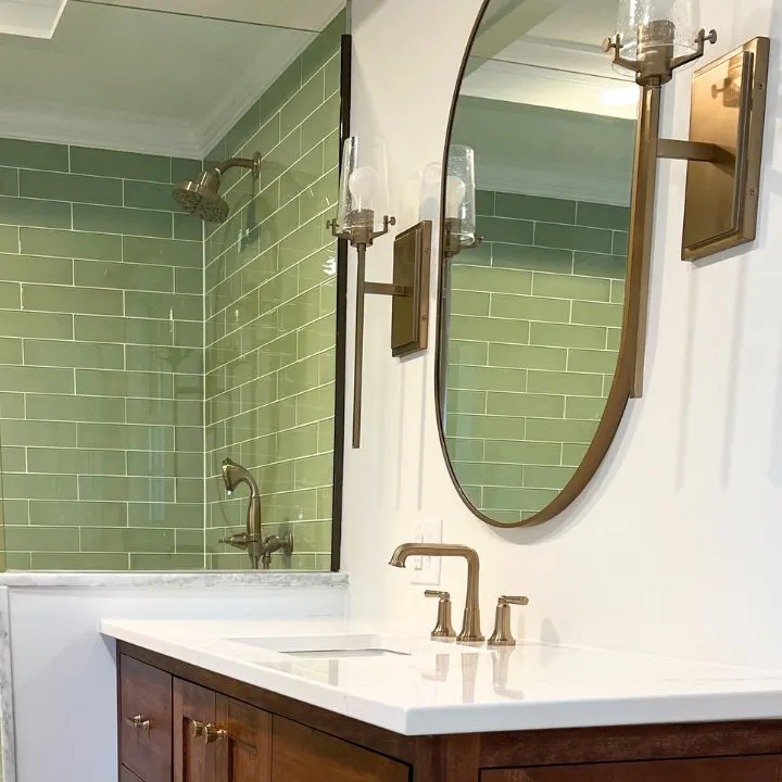 Bathroom with champagne bronze fixtures. 